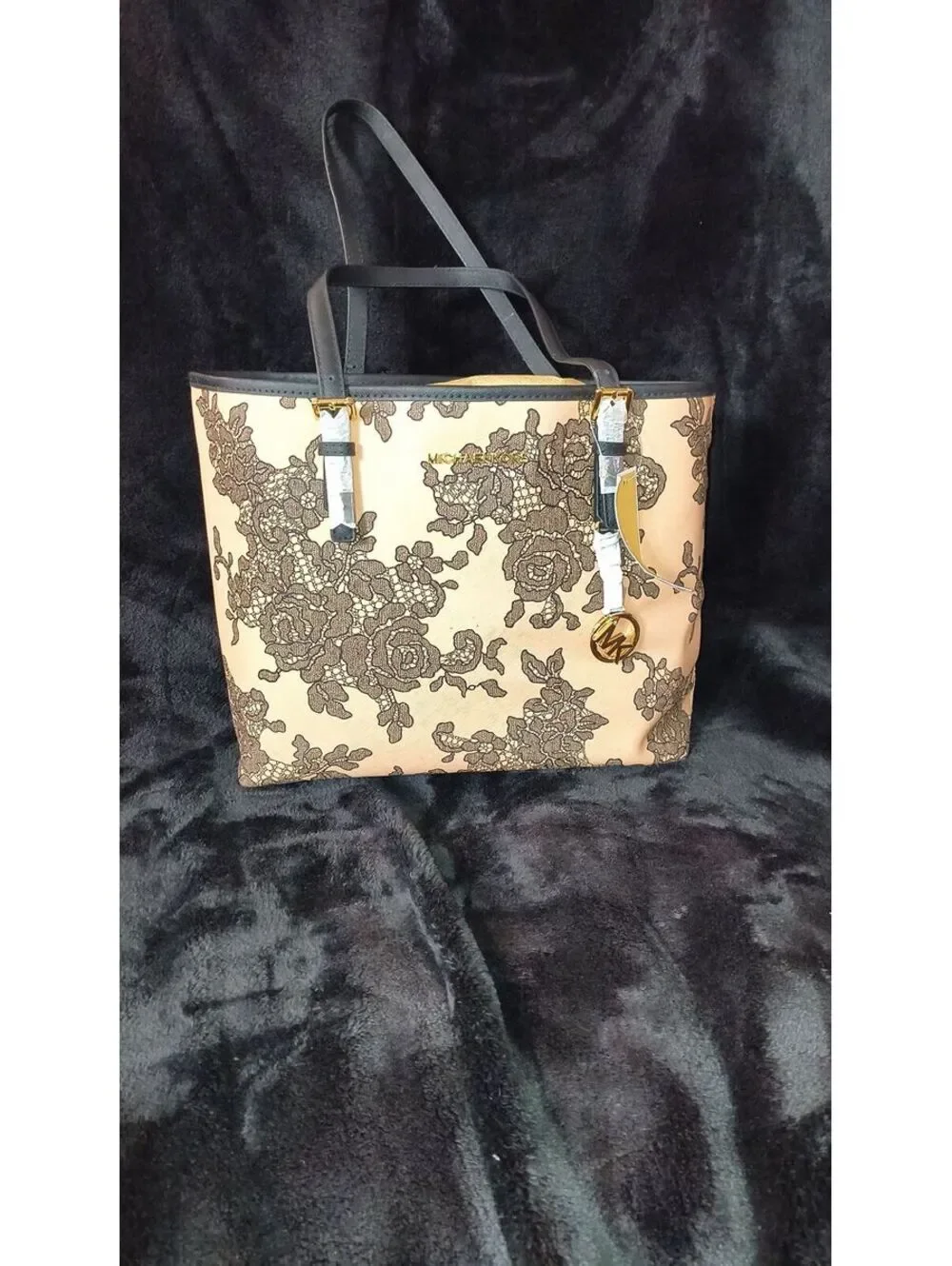 81. Michael Kors Emery Lace Jet Set Tote NWT